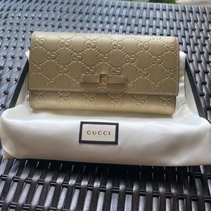 authentic Gucci GG monogram gold leather wallet